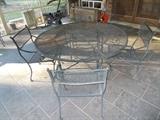 Metal Patio Table/4 Matching Chairs - has umbrella & holder for the middle...Sold as a set!!!!!!