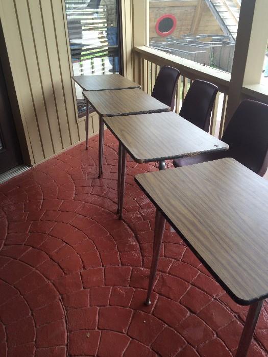 Four matching school desks