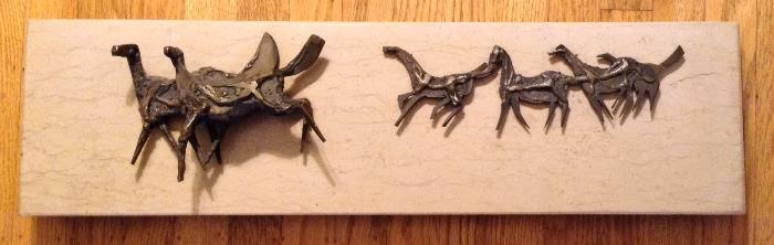 Cast bronze low wall relief sculpture of five galloping horses by Oregon artist Tom Hardy - mounted on marble. Measures 27" long, 7" tall & 4" deep.