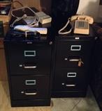 Locking 2 drawer black cabinets by Lorell - commercial grade, 25" deep.  We have 3 of these for sale. Plus power strips & vintage push button phone.