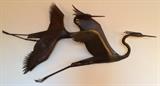 First part of a wall-mounted cut & welded steel sculpture of herons by noted Oregon artist Tom Hardy (b. 1921). This part is 44" long, 23" tall & 16" deep.