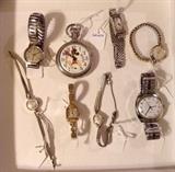Watches by Girard Perregaux, Elgin, Waltham, Bulova, Gruen, Elmont & Timex.  Also vintage Mickey Mouse pocket watch.