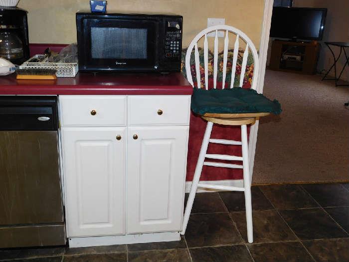Microwave and bar stool
