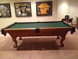 Brunswick Billiards / pool table in excellent condition. Comes with rack, cue, sticks, balls, and other accessories