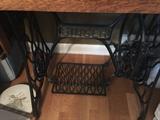 $150   Singer Tredle sewing machine and cabinet