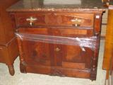Walnut Antique Marble Top Washstand that is coming from Estate Storage