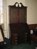 Two-piece Oxbow Front Chippendale Style Secretary Bookcase.