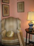 Wing-back Chair, Chinese Blue and White Jar-form Lamp, Oval Louis XVI Style Side Table with Inlaid Patera, Japanese Theatrical Woodblock Prints