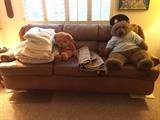 Sofa and bedding and teddy bears