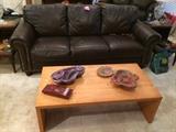 Leather sofa and Scandinavian style coffee table 