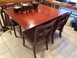 Duncan Phyfe Dining drop leaf table with 4 side chairs and one hostess 'arm' chair, 1950's vintage.