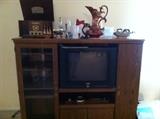 24" TV with remote and Entertainment Center