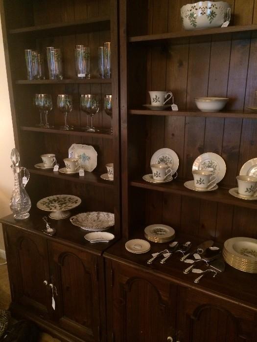 Two of several hutches; Lenox Christmas dishes and glassware