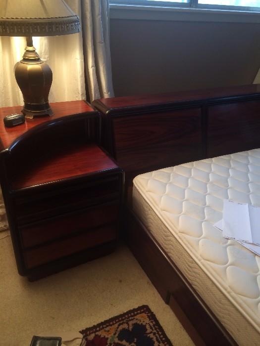 Quite unique matching contemporary bed, nightstands, dresser, and chest  
