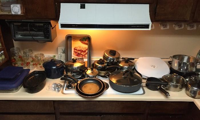 Pots and Pans, Pyrex and lots of kitchen items not shown in photos