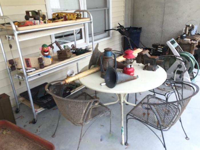 Metal Table and Chairs, Old rusted toys.