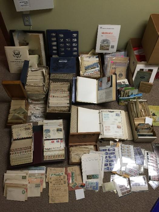 Hundreds of first day covers.  Some are very old.  Stamps and Stamp collections.  