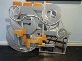 John Okulick sculpture in metal and wood.