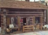 The Toy Log Cabin Grandpa Built (exterior)