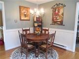 Oak kitchen table with 4 chairs & leaves