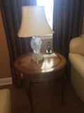 leather top side table with crystal lamp