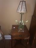 Side table with lamp & floral arrangement