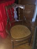 Antique chair with cane seat