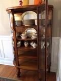 china/curio cabinet with bowed glass front