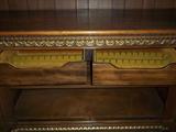 silverware drawers in both the sideboard and buffet.
