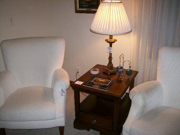 Occasional Chairs, Stiffel Lamp, Terry Redlin ornaments.