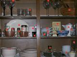 Kitchen items including Pink Depression MANHATTAN creamer/sugar