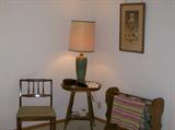 Antique Oak parlor table, Afghans, and a quilt rack.