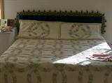King size bed, king size double wedding ring quilt and shams