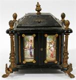 Lot #1004, VIENNESE ENAMEL & EBONY MINIATURE CASQUE, 19TH C., H 5", W 4 1/2"