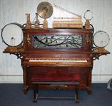 lot #53 STUYVESANT PIANOLA-ORCHESTRIAN UPRIGHT PIANO AND MUSIC ROLLS (33), C1900, H 80", W 99", D 30"