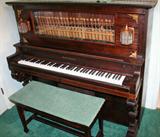 lot #54 SMITH & BARNES ORCHESTRIAN UPRIGHT PLAYER PIANO, WITH 31 MUSIC ROLLS, H 57", W 63", D 28"