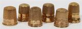 lot #1282 ANTIQUE 10 KT [5]& 14 KT [1] YELLOW GOLD THIMBLES, SIX, H 3/4"