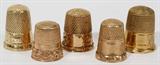 lot #1283 ANTIQUE 14 KT YELLOW GOLD THIMBLES, [4], & [1] 9 KT YELLOW GOLD THIMBLE, H 3/4"