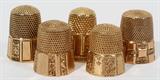lot #1281 ANTIQUE 14 KT YELLOW GOLD THIMBLES, FIVE, H 3/4"
