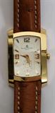 Lot #2027, BAUME & MERCIER MEN'S 18 KT. YELLOW GOLD WRIST WATCH IN BOX.