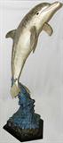 Lot#1052, ROBERT WYLAND (1956-), CAST BRONZE DOLPHIN SCULPTURE, #47/200, 1992, H 60"