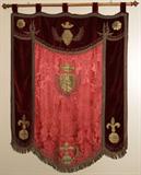 Lot#2232, EUROPEAN RED SILK & VELOUR ARMORIAL BANNER, 19TH C., 48" X 36"