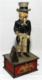 Lot#2474, AMERICAN CAST IRON MECHANICAL BANK, "UNCLE SAM", H 11 1/2", L 5"
