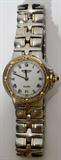 Lot#1097, RAYMOND WEIL STAINLESS STEEL, 18 KT YELLOW GOLD, SAPPHIRE LADY'S WRISTWATCH