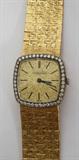 Lot#68, TIFFANY & CO. 18 KT. YELLOW GOLD & DIAMOND WRISTWATCH, L 6 7/8"