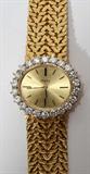 Lot#99, PIAGET LADIES' DIAMOND AND 750 YELLOW GOLD WRISTWATCH, L 6 7/8"
