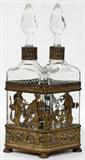 Lot#1200, FRENCH CRYSTAL COLOGNE BOTTLES (2) IN A GILT METAL FRAME, C. 1920, H 11"
