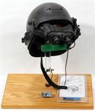 Lot#203, 'TERMINATOR 2: JUDGMENT DAY' HELMET, WORN BY STEVE QUALE, H 8", W 13"Helmet worn by Steve Quale in the future war scene with the "old John Connor". Dimensions are approximate; the helmet is mounted on a wood base. Includes a Certificate of Authenticity from Camair Research, Inc..
