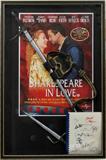 Lot#204, 'SHAKESPEARE IN LOVE' SWORD, BELT, & AUTOGRAPHED MOVIE SCRIPT, ALL IN A SHADOWBOX FRAMEAs taken from Certificates of Authenticity provided by "Premiere Props" and "Tuxedo Memorabilia", lot includes: "Lord Wessex's (Colin Firth) screen used stunt sword & sword belt", a "screen used silver rubber prop dagger", "Sir de Lesseps' screen used black leather sword belt", and a script from "Shakespeare in Love" signed by Joseph Fiennes, Gwyneth Paltrow, Geoffrey Rush, Simon Callow, Tom Wilkinson, Judi Dench, Ben Affleck, and Colin Firth. All framed and under glass, 41" x 27" overall.
