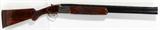 Lot#212, BROWNING CITORI 'LIGHTNING' 12 GAUGE, #13178 OVER AND UNDER SHOTGUN, L 26" BBLS,,Browning Citori 'Lightning' field grade III shotgun having 26" over and under 'special steel' ribbed barrels (steel shot), 3" chambers with interchangeable front colored sights, mid barrel stainless steel bead, five Invector choke tubes with wrench, (for steel shot); 'Magna-ported'; walnut stock and checkered forearm, 'Decelerator' butt pad; 13 1/4" length of pull; gold trigger; engraved stainless steel receiver with upland game scenes. With original box. MODERN FIREARM, LONG GUN PAPERWORK REQUIRED;